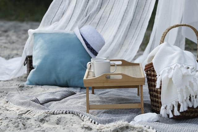 Picnic items on sand